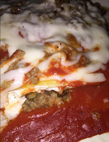  Layers of Pasta Sheets, Ricotta Cheese, Crumbled Meatballs, Marinara Sauce, and Melted Mozzarella Cheese served with two pieces of Garlic Bread