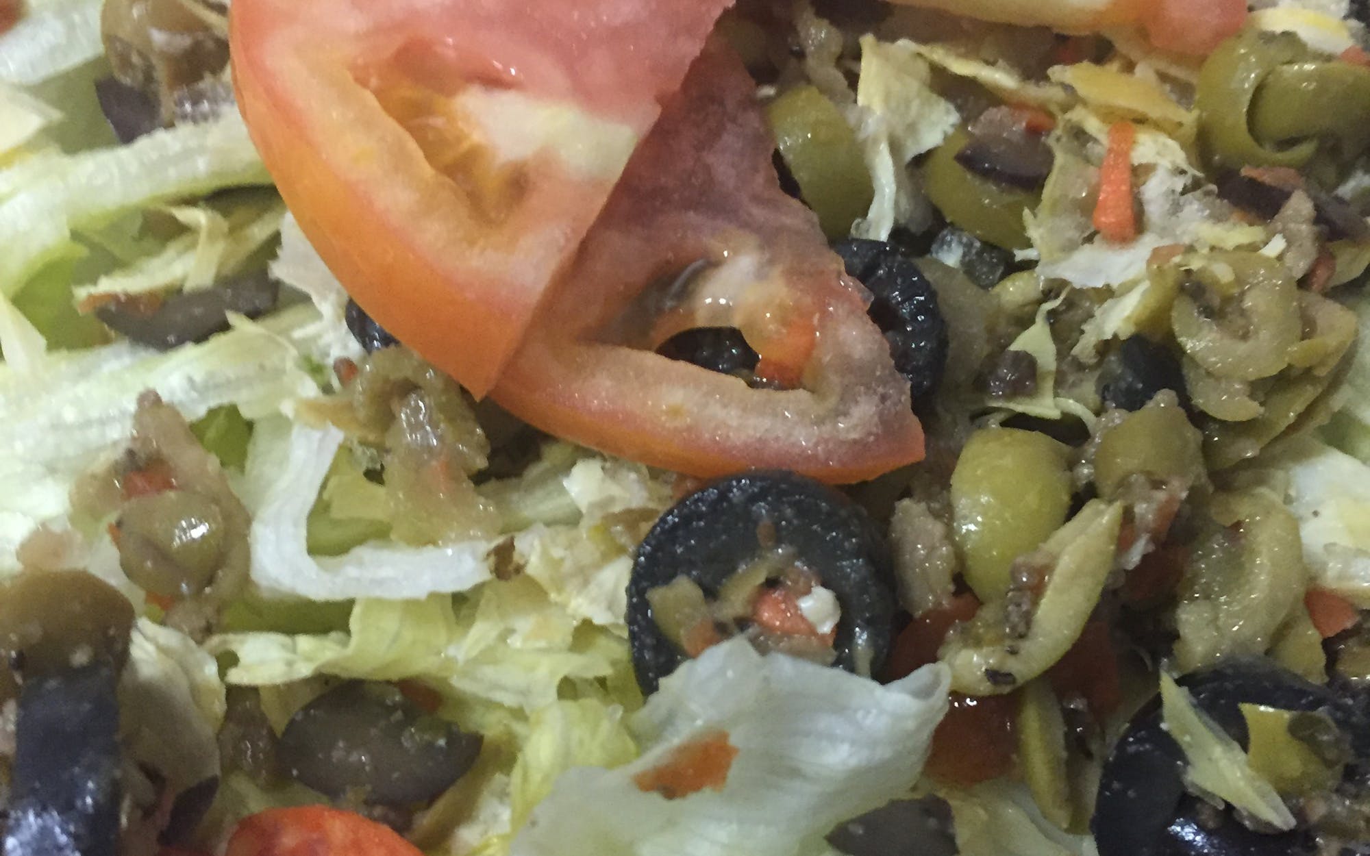 Jalapenos, Lettuce, Artichoke Tomatoes and Pepperoni Olive Salad