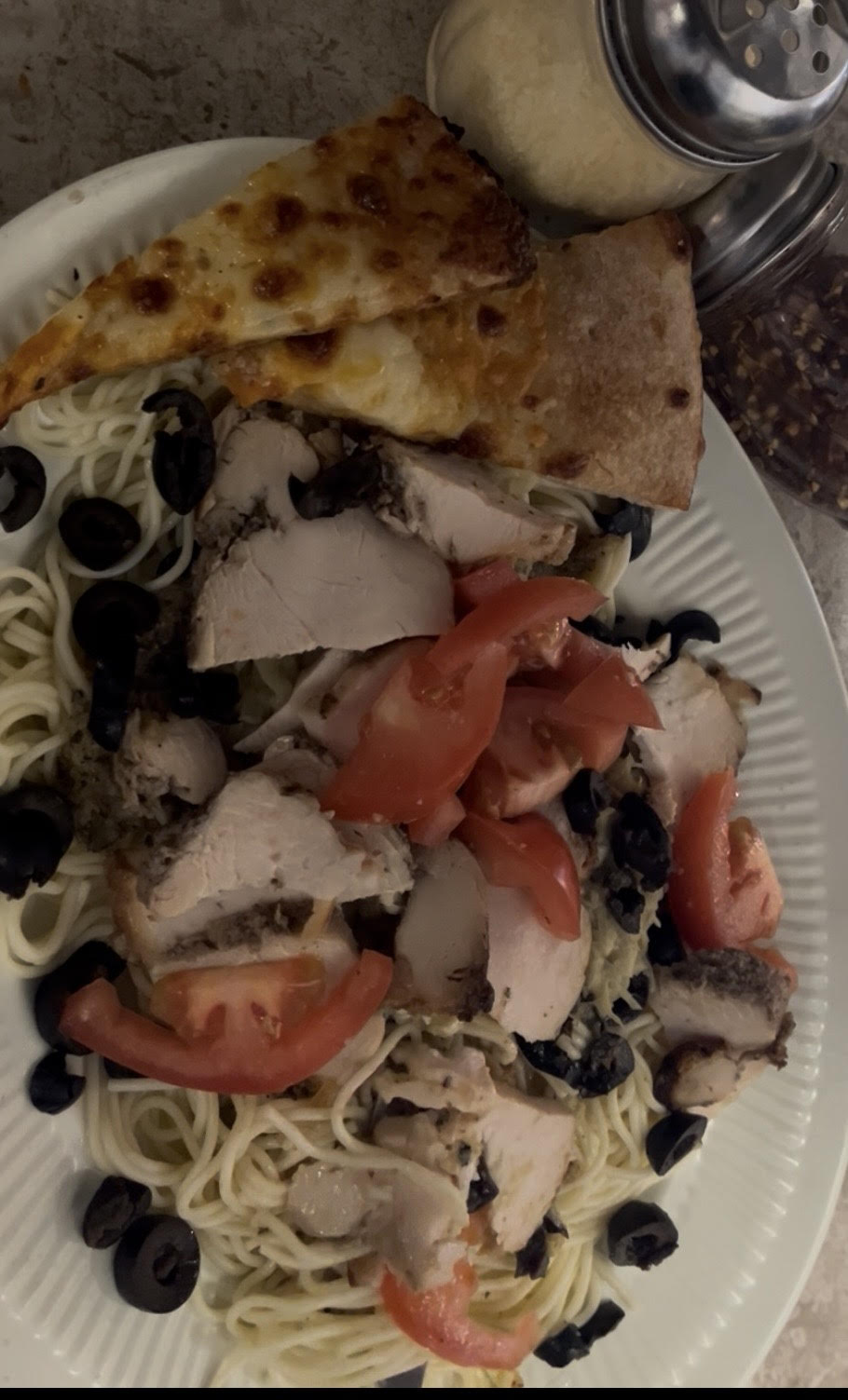 Garlic Sauce, Fresh Tomatoes, Chicken, Black Olives, Artichoke and Angel hair pasta