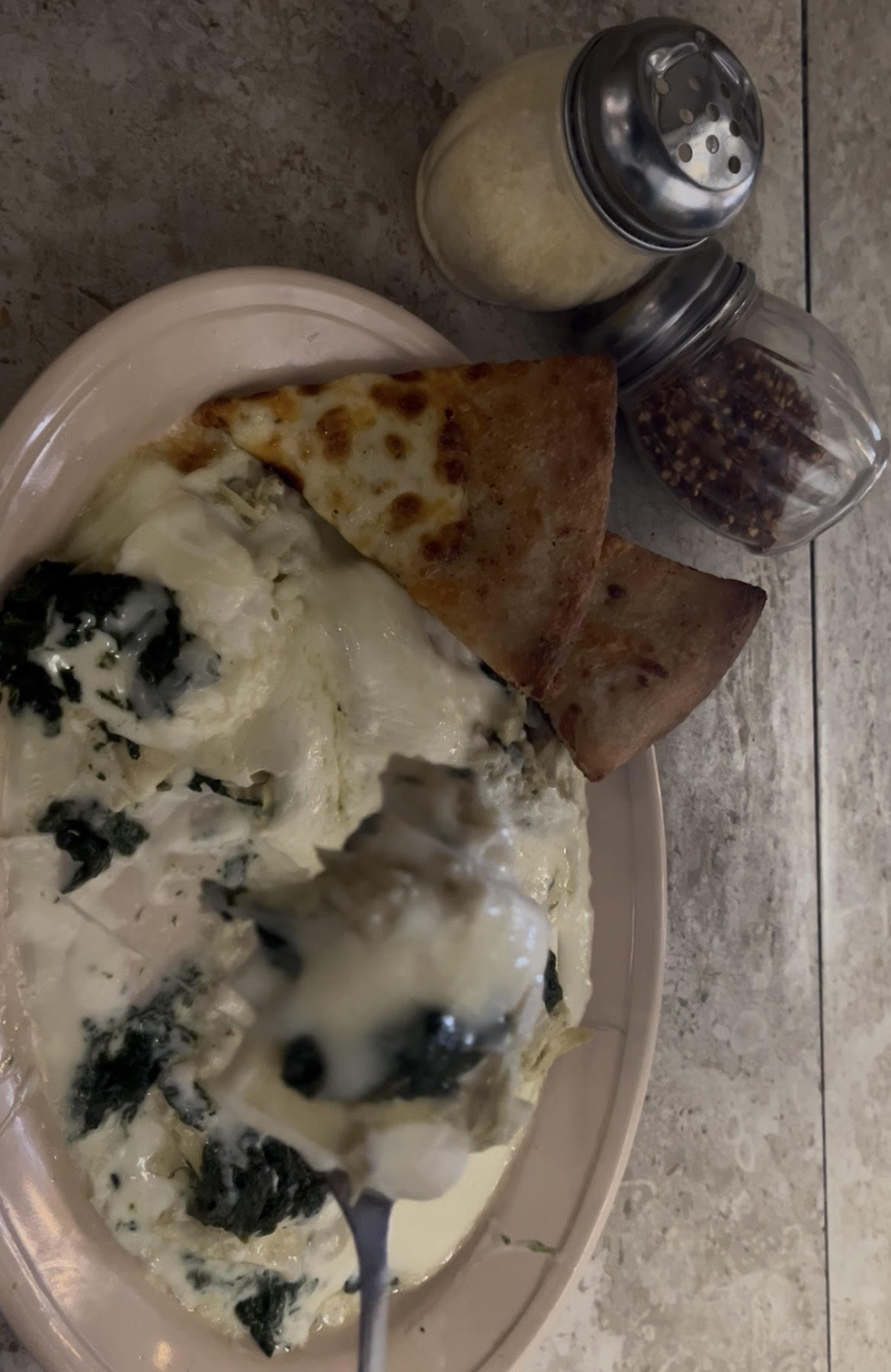 Alfredo sauce, pasta sheets, ricotta cheese, spinach and artichoke topped with mozzarella cheese.