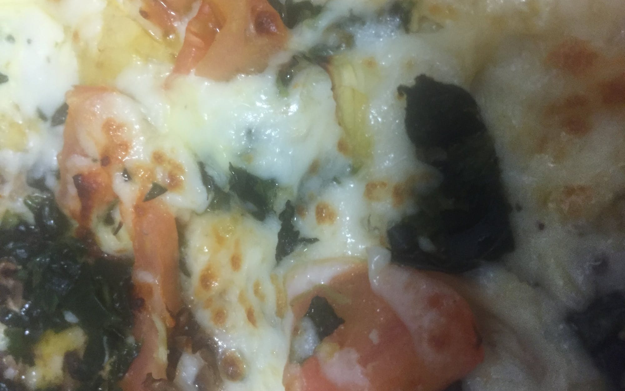 Fresh Mushrooms, Mozzarella Cheese, Fresh Tomatoes, Artichoke, Garlic Sauce and Spinach