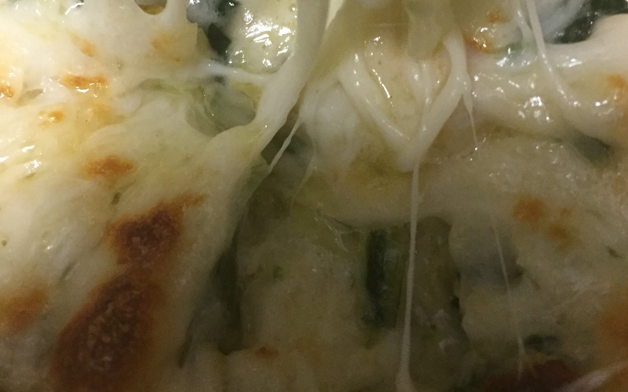 Spinach, artichokes, parmesan, and garlic blended into the most addictive dip of all time.  Served with garlic bread.